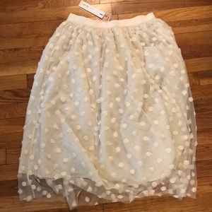 White tulle skirt with rosettes